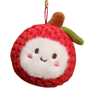 Cute lychee plush keychain featuring red textured knit and smiling face design