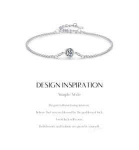 Close-up of S925 sterling silver chain bracelet with a single round moissanite stone