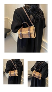 Detailed views of brown suede crossbody bag with plush trim worn by a model in soft light