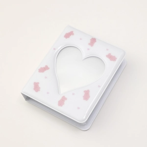 Mini photo album with heart-shaped window and cute pink bear pattern on white cover