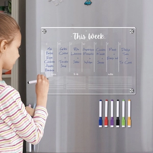 Clear acrylic magnetic weekly planner board for fridge shown with six colorful markers