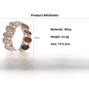 Macro detail of retro alloy stretch bracelet with amber oval resin inlay and dimensions