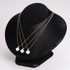 Minimalist hexagon shell necklace with sparkling rhinestones on an elegant gold chain