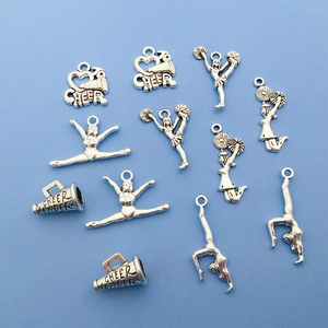 Mixed set of silver cheerleading charms featuring cheer leader megaphone and athlete pendants