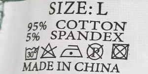 Detailed laundry tag of cotton thong showing size L and fabric care instructions