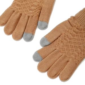 Close-up of caramel brown knit gloves with diamond pattern and three-finger touchscreen tips