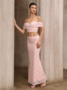 Pink lace two-piece set featuring off-shoulder crop top and slim fit mermaid skirt