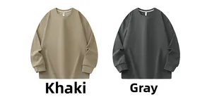 Detail view of khaki and grey crewneck sweatshirts with ribbed cuffs and hem