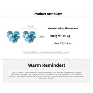 Detail view of iris blue flower stud earrings showing 2.9x2.3cm dimensions and rhinestone
