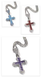 Detailed set of iced-out cross pendants with blue, red, and purple stones on cuban chains