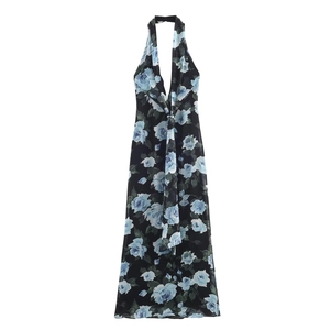 Halter neck long dress with blue rose prints on black pleated fabric against white background