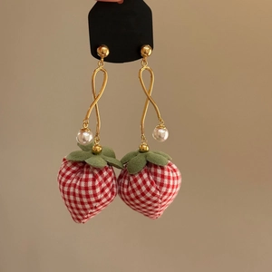 Elegant strawberry drop earrings with red gingham pattern, pearls, and gold metal frames