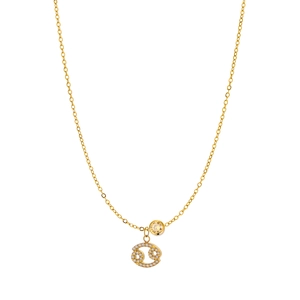 Detailed close-up of a gold Gemini zodiac necklace with yellow gemstone and clear crystals
