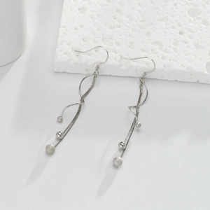 Detail of 925 sterling silver stamp on vintage ethnic tassel earrings with beads