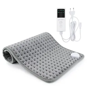 Detail of grey electric heating pad with digital remote and soft plush texture