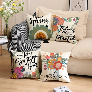 Set of four linen spring floral pillow covers with elegant botanical prints and quotes