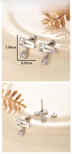 Detail view of silver spoon and fork lock earrings with dimensions 1.04cm x 0.93cm