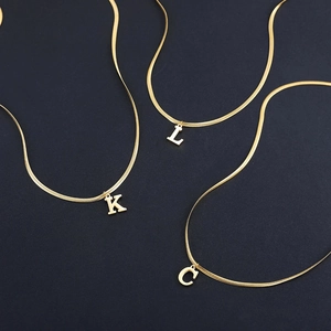 Golden stainless steel flat snake chain necklace with initial letter K L C pendants