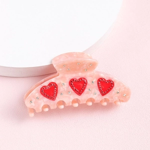 Pink marble large hair claw clip with red rhinestone hearts for girls hair styling