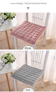 Detail of pink and grey flannel chair cushions with embossed grid texture and soft fabric