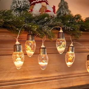 LED Christmas wishing bottle string lights with mini Santa and snowman figurines