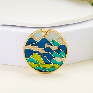 Vintage Chinese landscape enamel brooch with gold frame featuring mountain and sun pattern
