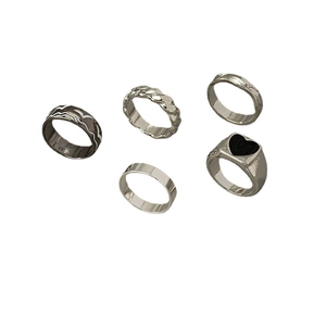 5-piece vintage geometric stackable ring set in silver with black heart and wavy patterns
