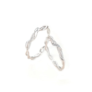Elegant 925 sterling silver Mobius rings with small zircon accents and open design