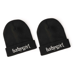 Pair of black knit beanies featuring white Gothic style babygirl embroidery on the cuff