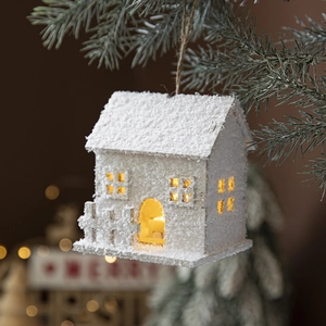 LED lit white Christmas house hanging ornament with warm yellow light and snow texture
