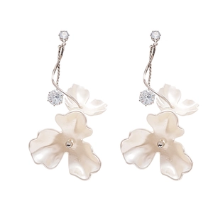 Elegant white floral earrings with zircon studs and delicate silver chain tassels