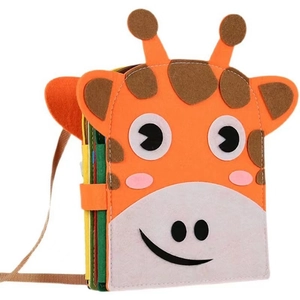 Detail of felt busy board featuring orange cartoon giraffe cover and colorful pages
