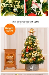 Detail of 60cm mini Christmas tree with warm LED lights, gold baubles, and reindeer felt base