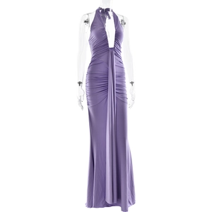 Close-up of elegant purple deep V-neck halter dress with pleated texture and backless detail