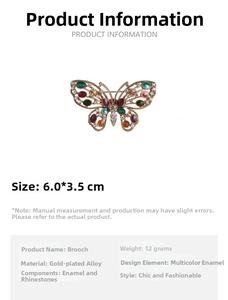 Detail of colorful butterfly brooch with gold plating, rhinestones and enamel, 6x3.5cm size
