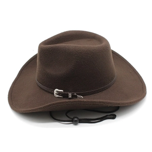 Detail of brown wool felt cowboy hat with carved silver buckle and windproof rope