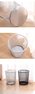 Detail of round metal mesh bin showing reinforced base and stackable iron design
