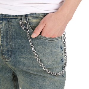 Street style titanium steel wallet chain with skull clasp on blue denim jeans