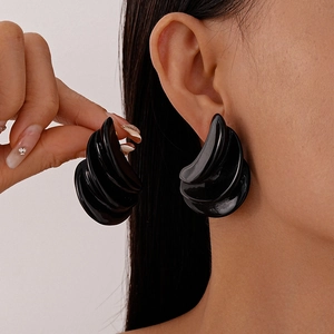 Chic black triple-layered geometric resin stud earrings with a retro shell-inspired design