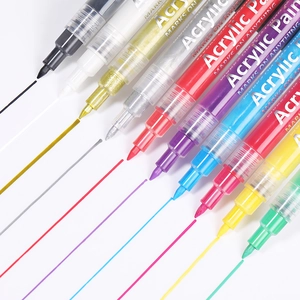 Detailed view of 12-piece acrylic paint nail pens showing vibrant ink strokes and fine tips