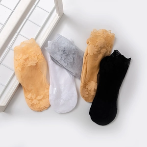 Lace ruffle ankle socks in four colors featuring elegant floral embroidery and sheer mesh
