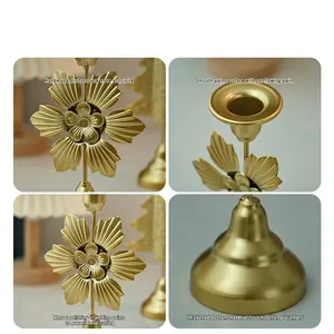 European gold iron candle holder set showing detailed petal design and sturdy base