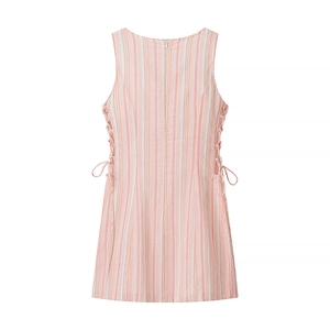 Detail of pink striped sleeveless mini dress showing the lace-up waist and back zipper