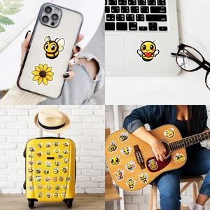Waterproof cartoon bee stickers shown on laptop, phone case, and luggage for DIY decoration