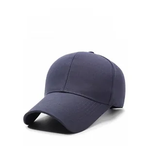 Detail of embroidered lettering and textured fabric on a navy blue outdoor baseball cap