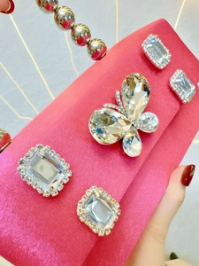 Rose pink silk evening bag with crystal butterfly buckle and silver bead chain strap