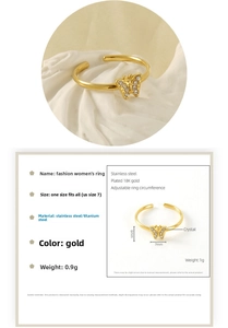 Detail view of 18K gold plated butterfly ring showing 6x7mm size and crystal inlay