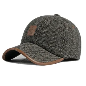 Winter herringbone baseball cap with ear protection and warm fleece lining in dark grey