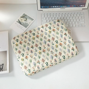 Floral quilted laptop sleeve for 13 inch iPad Pro and MacBook with zipper closure