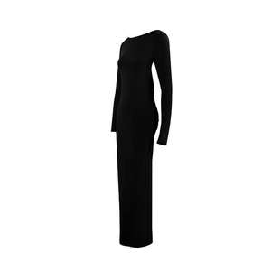 Side view of slim fit long sleeve black dress showing backless silhouette on white background
